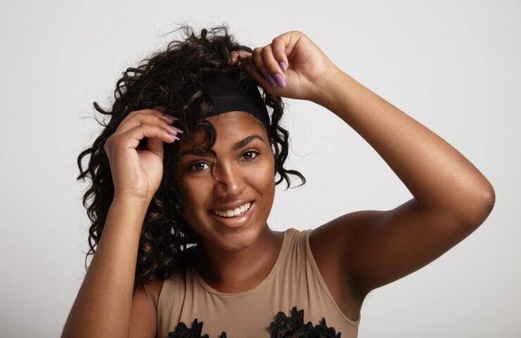 black-woman-have-fun-with-wig-curly-hair-wig_633478-2582